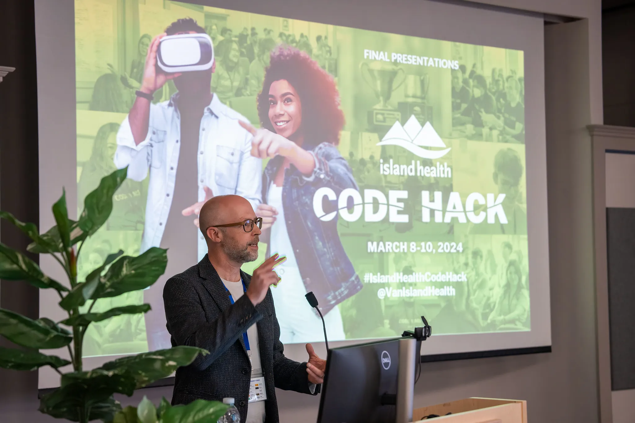 Matthew Miller speaking on stage at Code Hack 2024